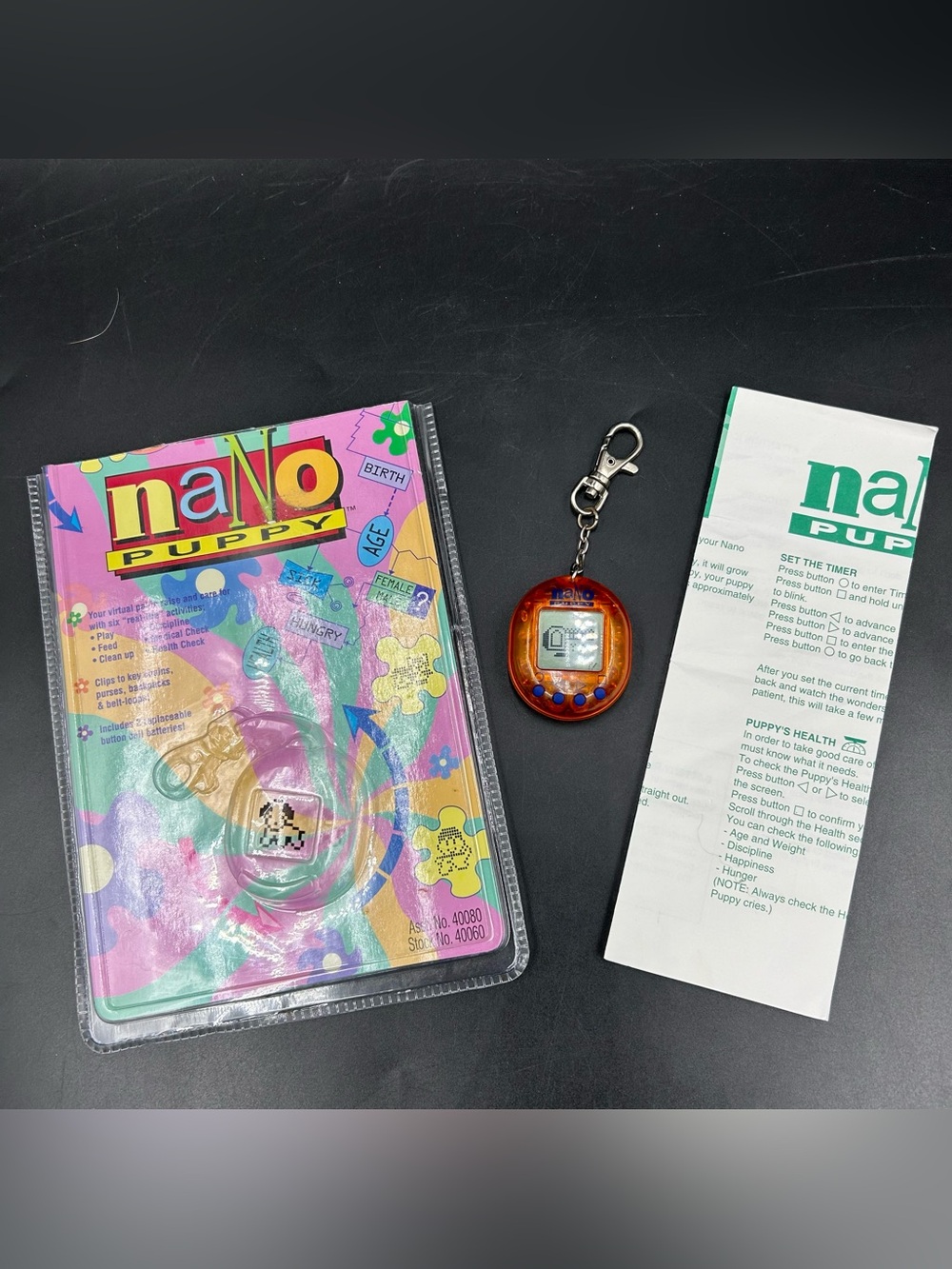 Vintage 1997 Nano Puppy Orange Virtual Pet Playmates Working Package Manual